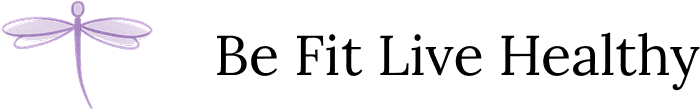 Purple dragonfly silhouette on black background.